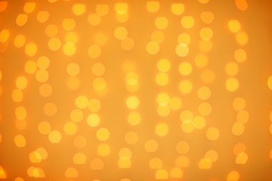 Photo of Beautiful gold lights as background. Bokeh effect