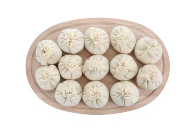 Board with uncooked khinkali (dumplings) isolated on white, top view. Georgian cuisine