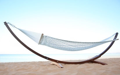 Photo of Empty hammock at seaside. Time to relax