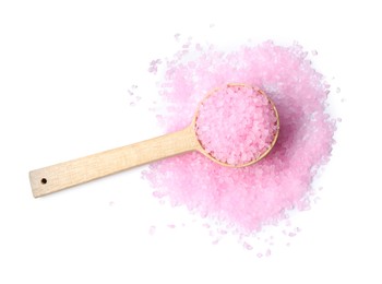 Photo of Wooden spoon with pink sea salt on white background, top view