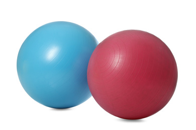 Photo of Different colorful fitness balls isolated on white