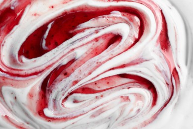 Photo of Tasty yoghurt with jam as background, top view