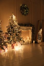 Festive room interior with beautiful Christmas trees