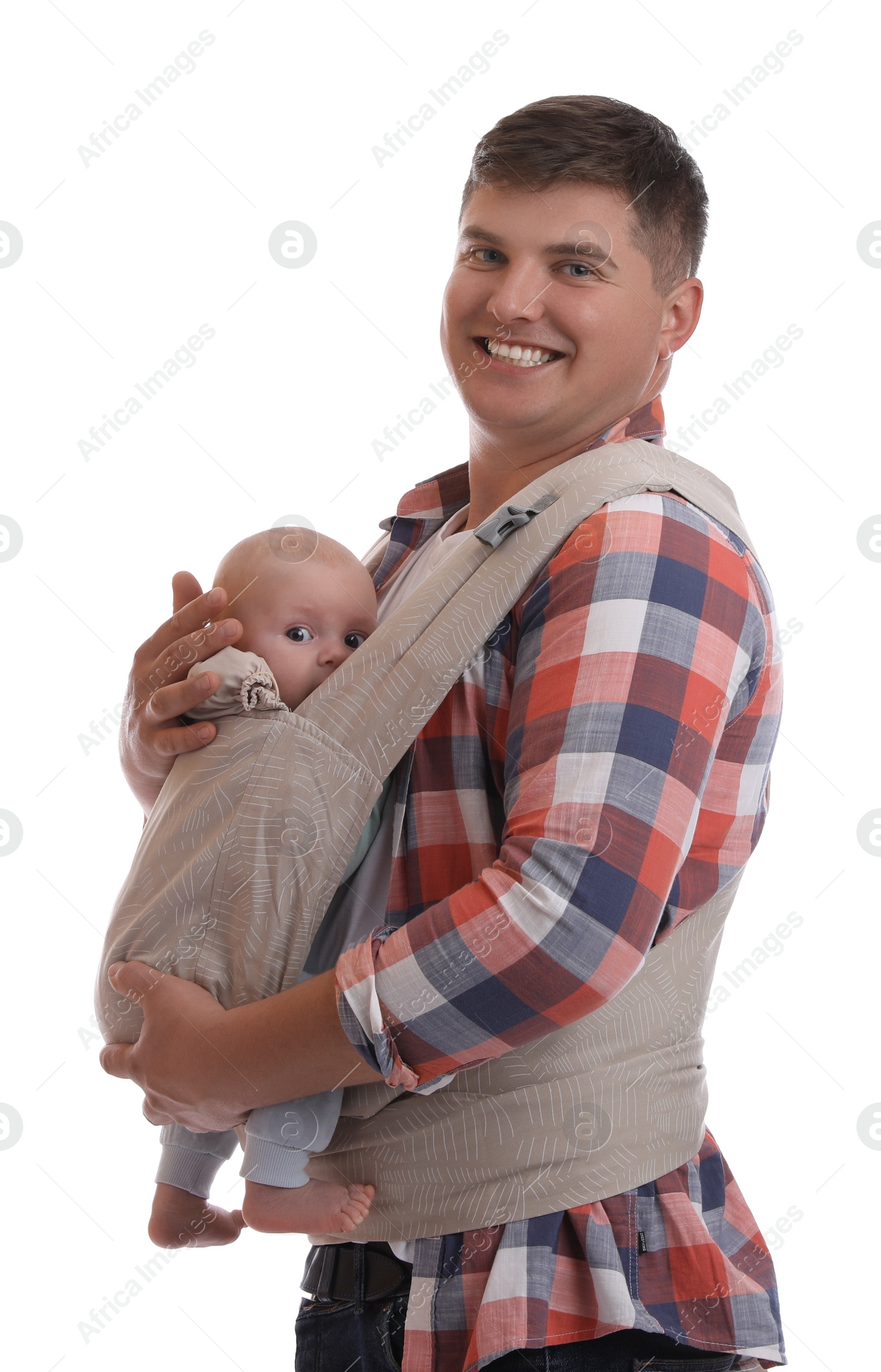 Photo of Father holding his child in baby carrier on white background