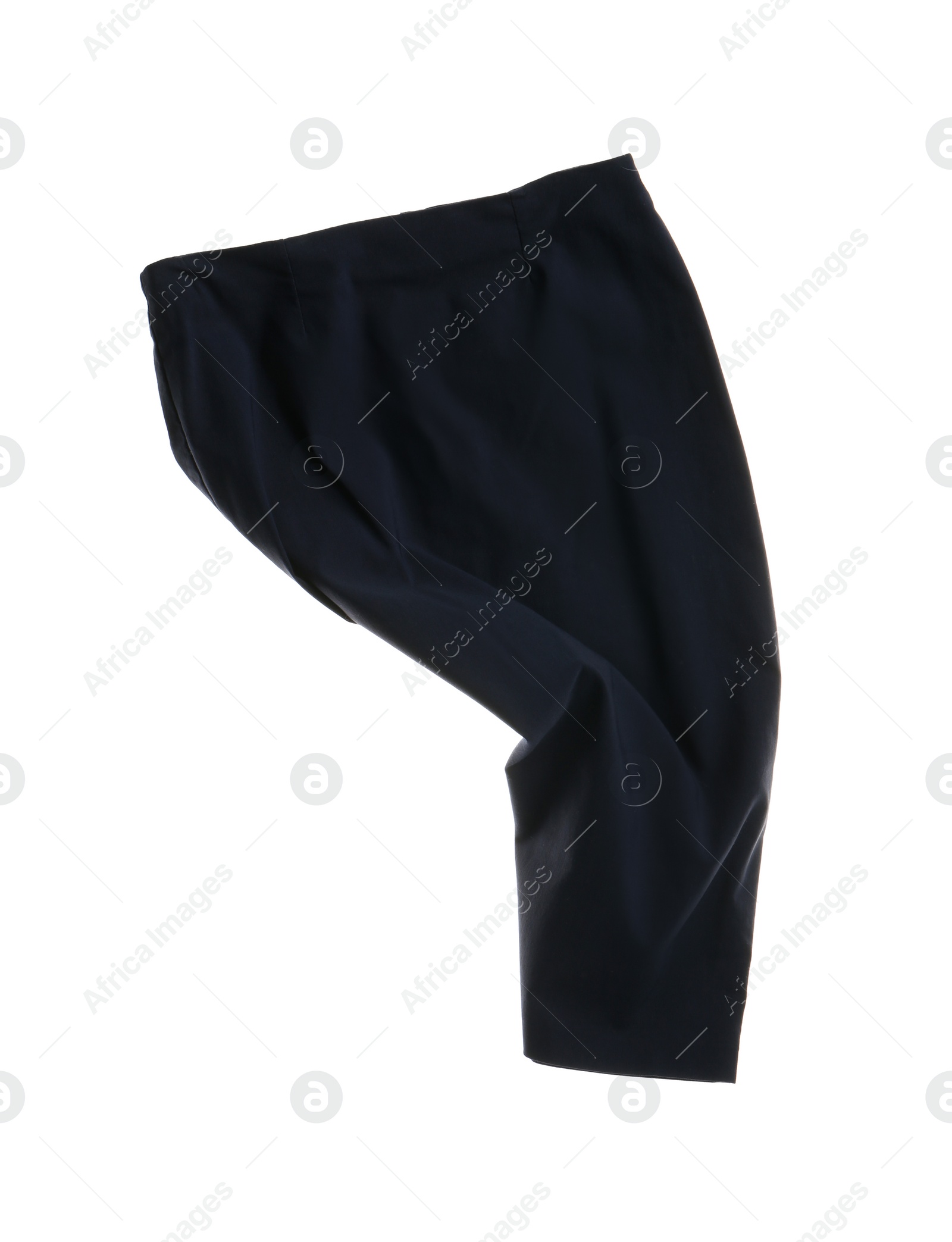 Photo of Rumpled black skirt isolated on white. Messy clothes