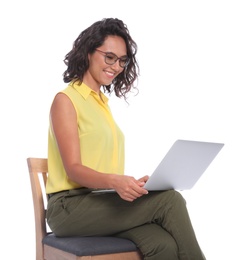 Photo of Happy young woman sitting on chair and working with laptop on white background