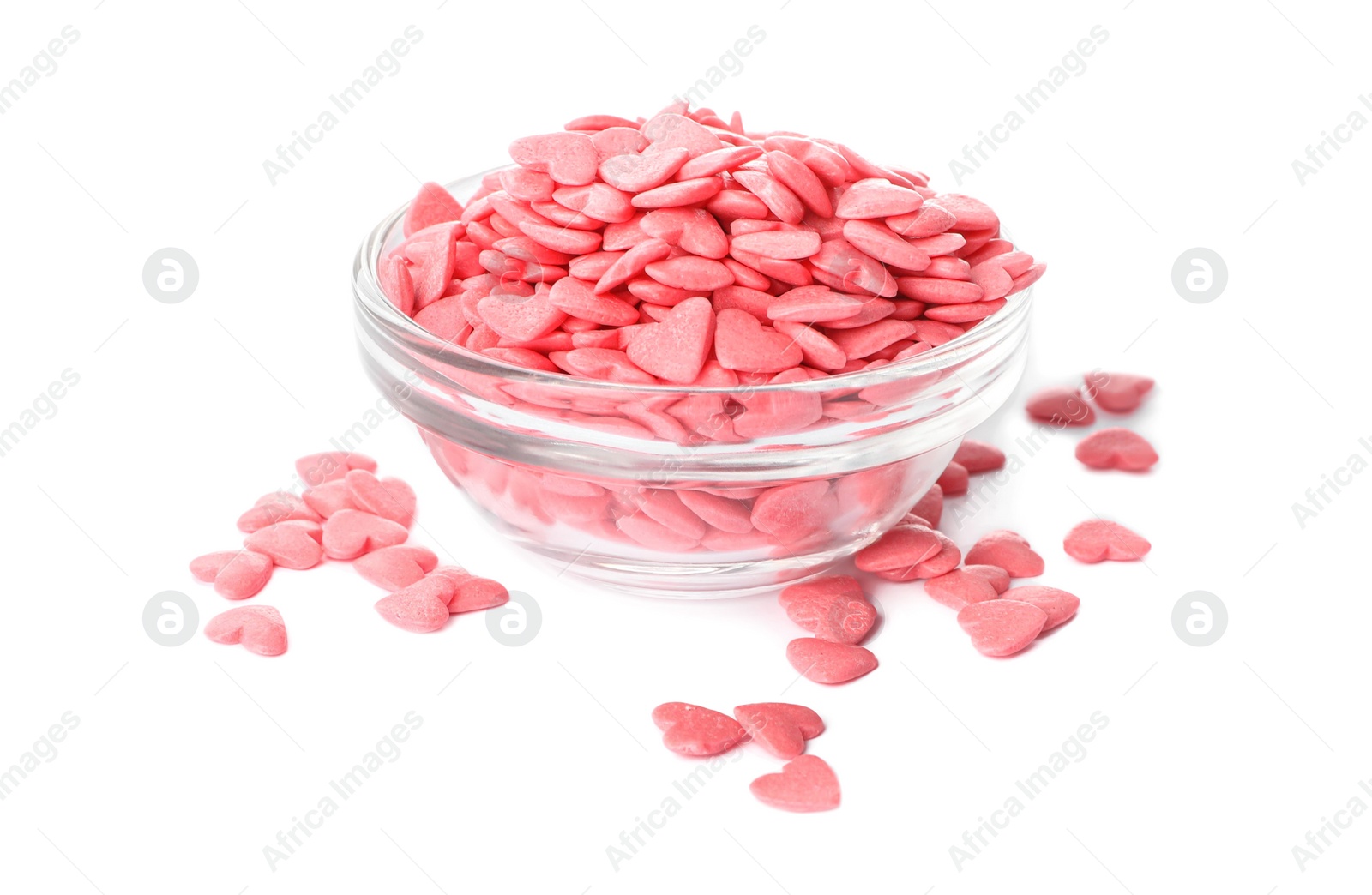 Photo of Sweet candy hearts in bowl on white background