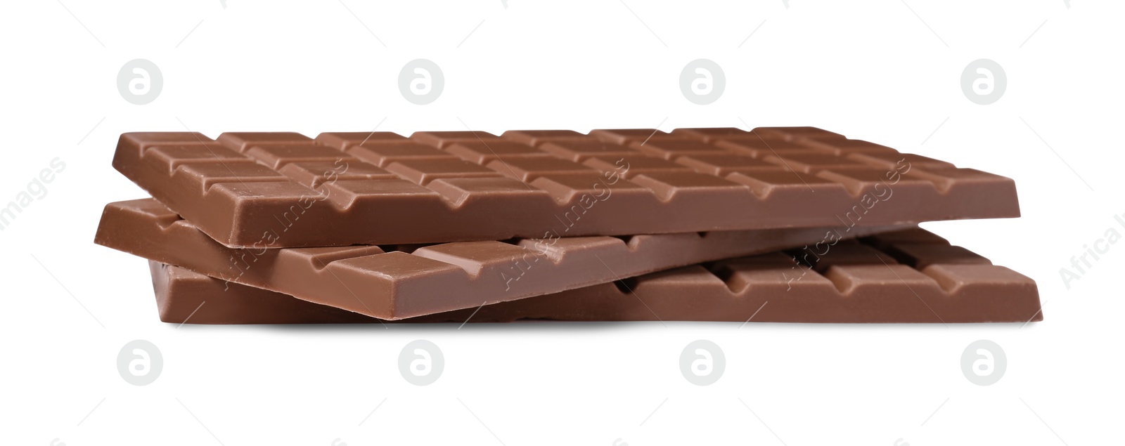 Photo of Delicious milk chocolate bars isolated on white