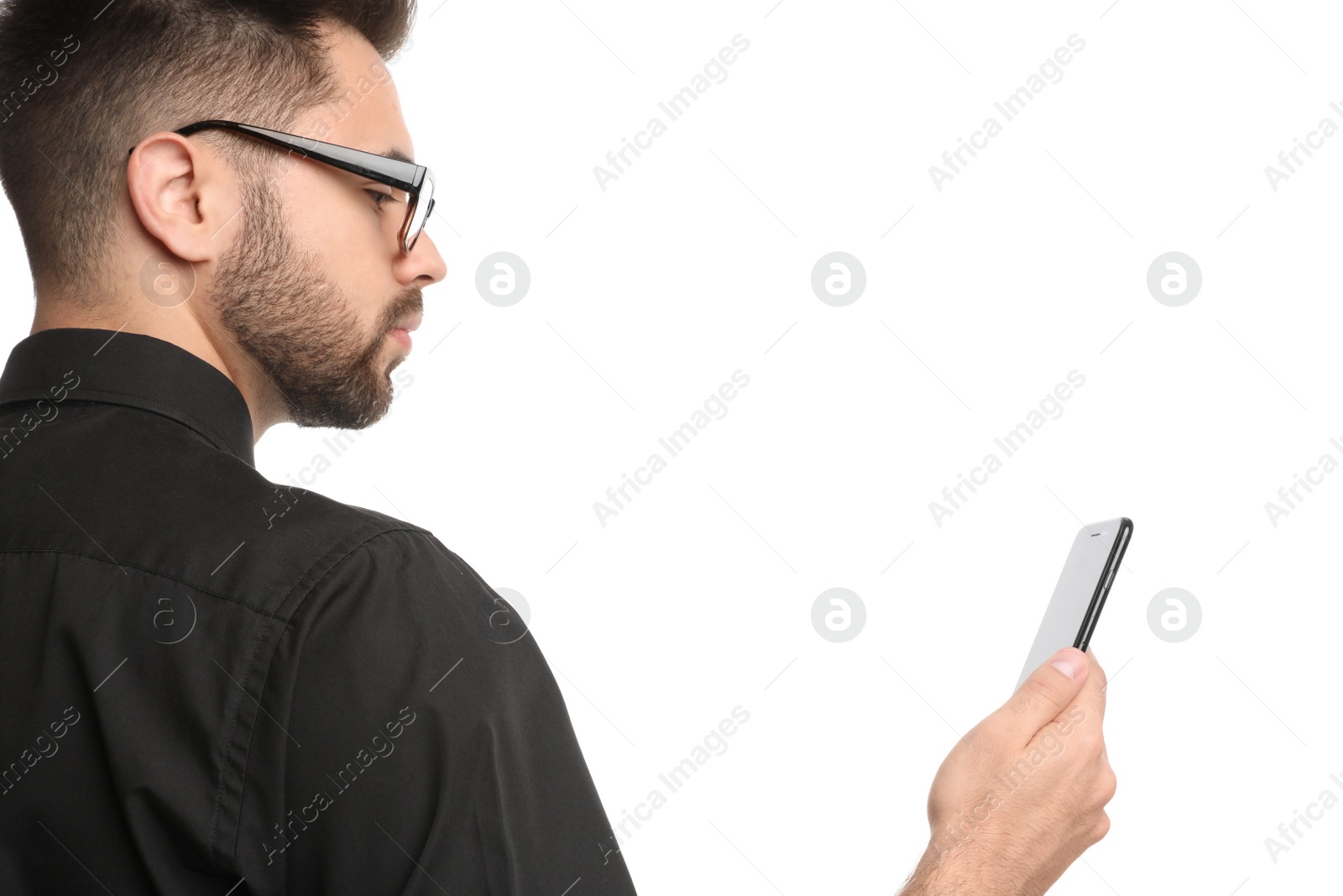 Photo of Young businessman with smartphone on white background