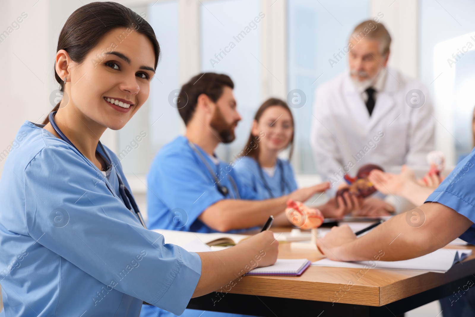 Photo of Portrait of young intern wearing uniform on lecture in university