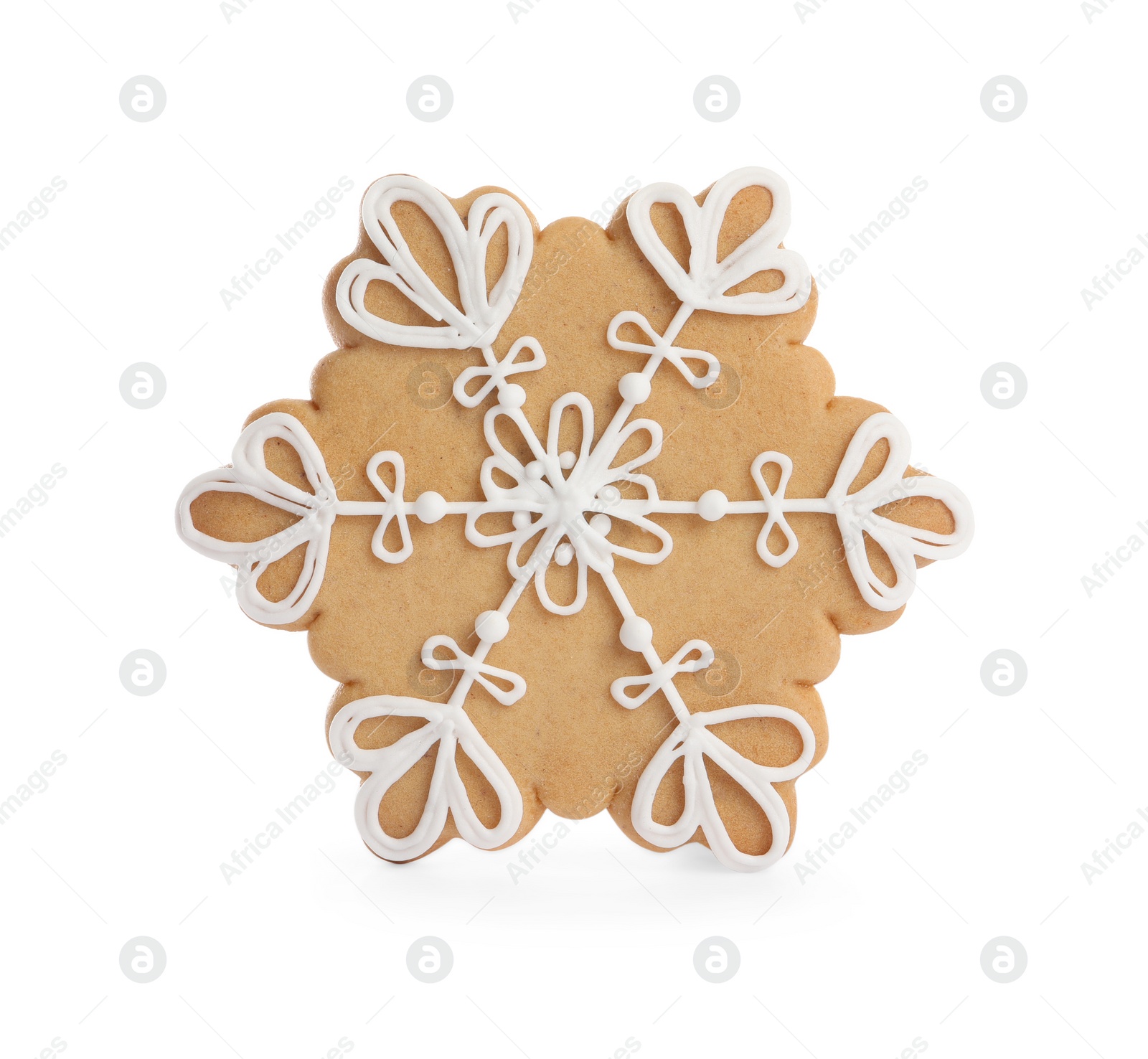 Photo of Tasty gingerbread cookie in shape of snowflake on white background. St. Nicholas Day celebration