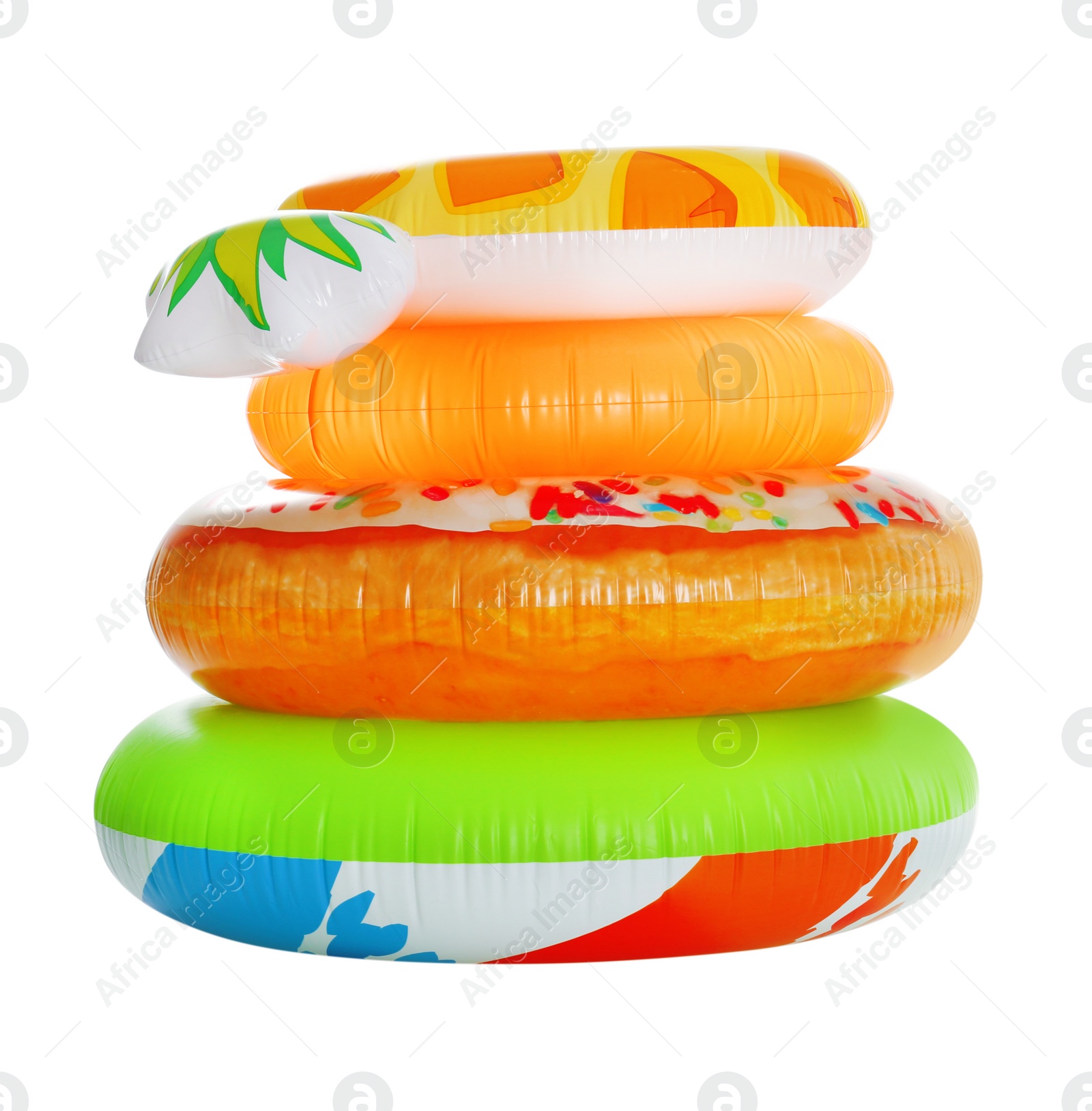 Photo of Stack of colorful inflatable rings isolated on white