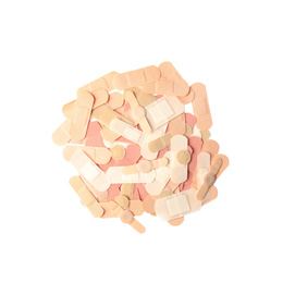 Photo of Different medical sticking plasters isolated on white, top view. First aid item