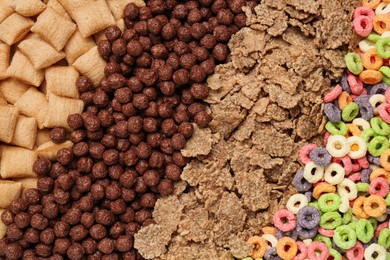 Photo of Different types of dry breakfast as background, top view