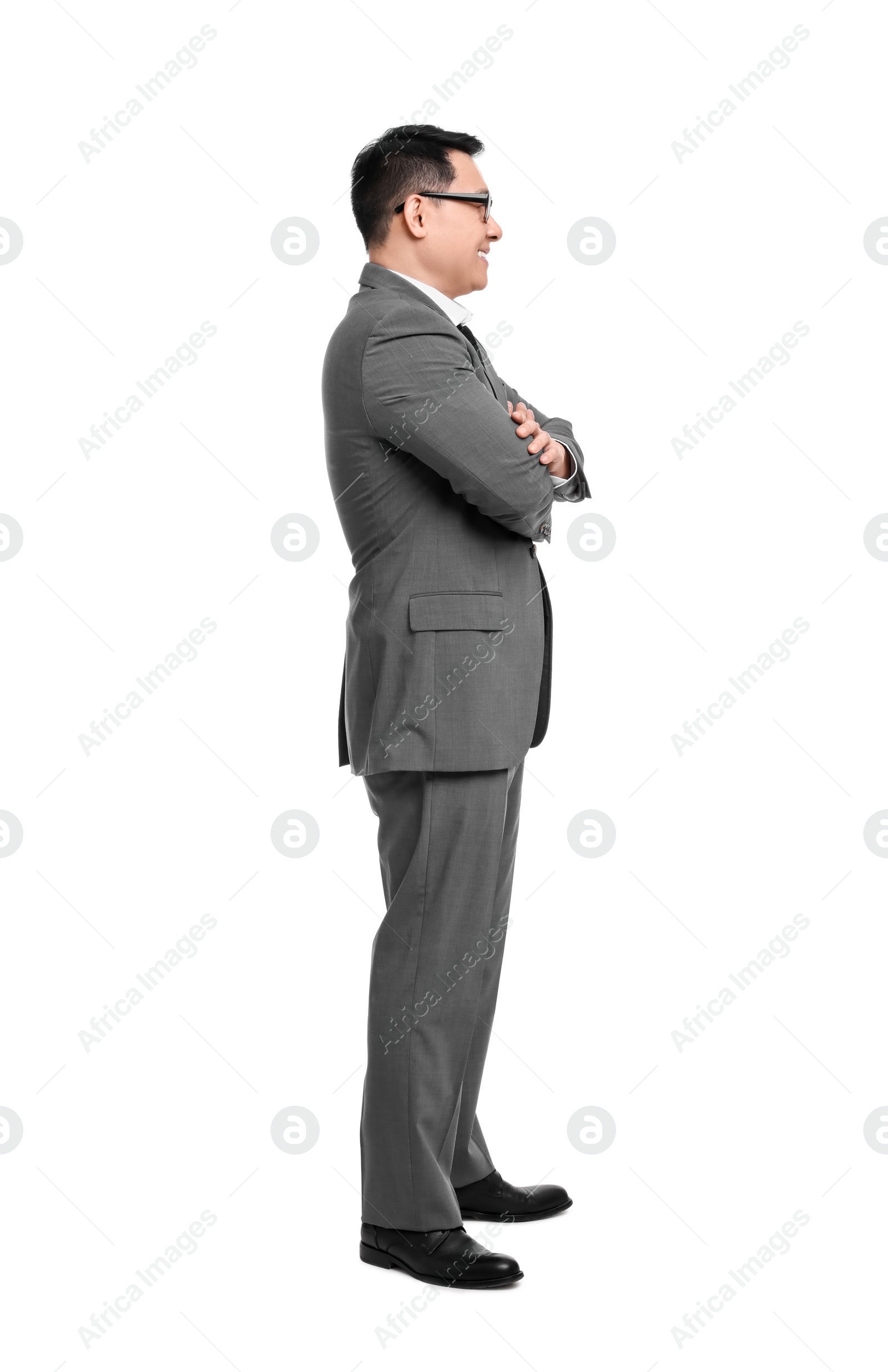 Photo of Businessman in suit wearing glasses on white background