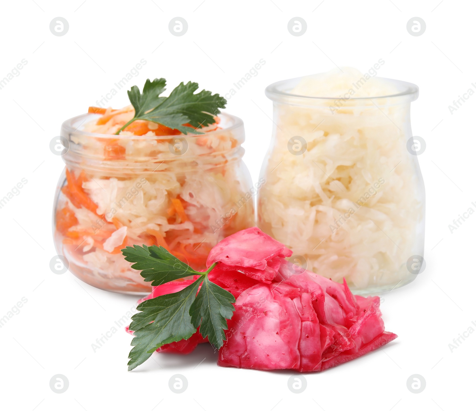 Photo of Delicious sauerkraut prepared according to different recipes with parsley on white background