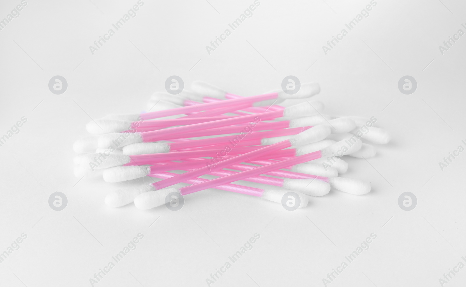 Photo of Clean cotton buds isolated on white. Hygienic product