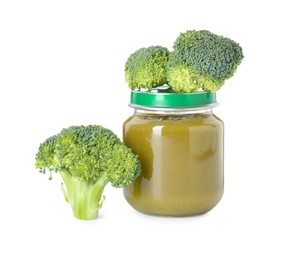 Tasty baby food in jar and fresh broccoli isolated on white