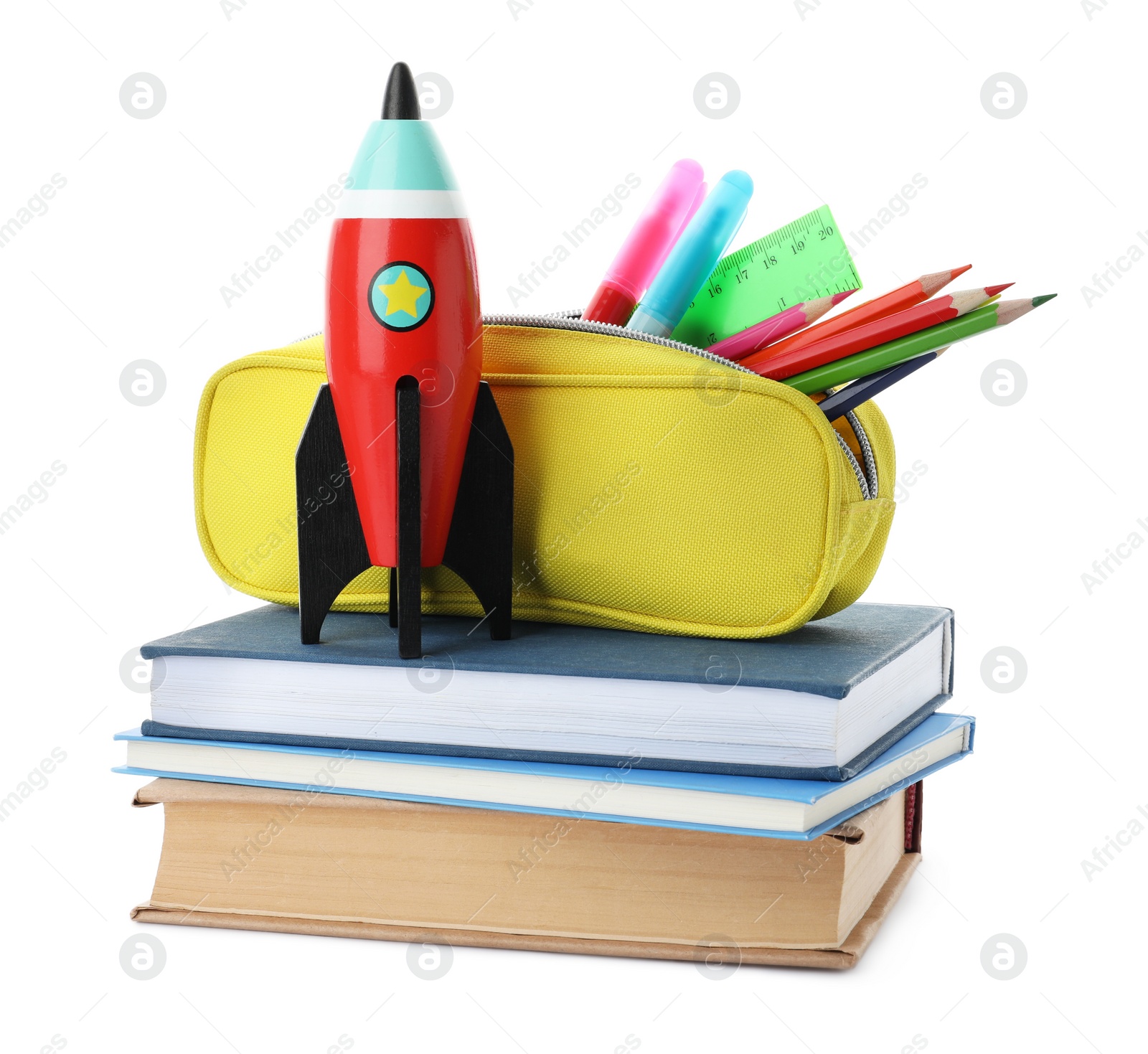 Photo of Bright toy rocket and school supplies on white background