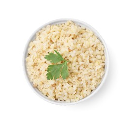 Cooked bulgur with parsley in bowl isolated on white, top view