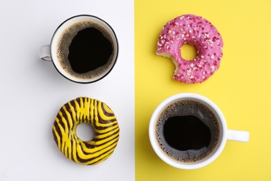 Photo of Tasty donuts and cups of coffee on color background, flat lay