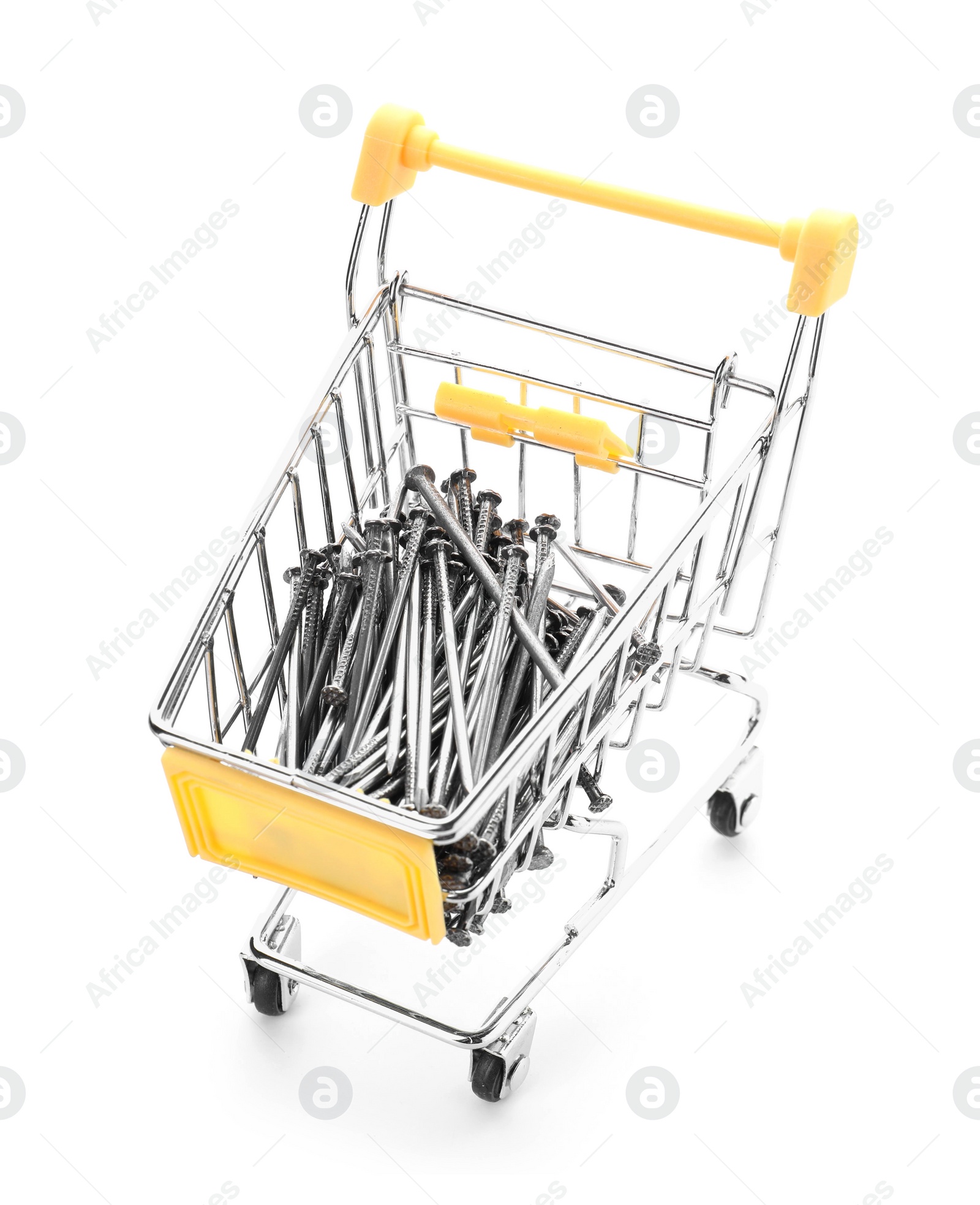 Photo of Small shopping cart with metal nails isolated on white. Construction tools