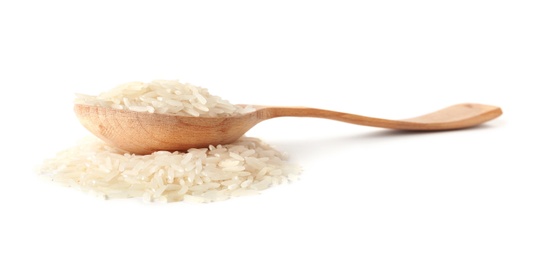 Spoon and uncooked long grain rice on white background