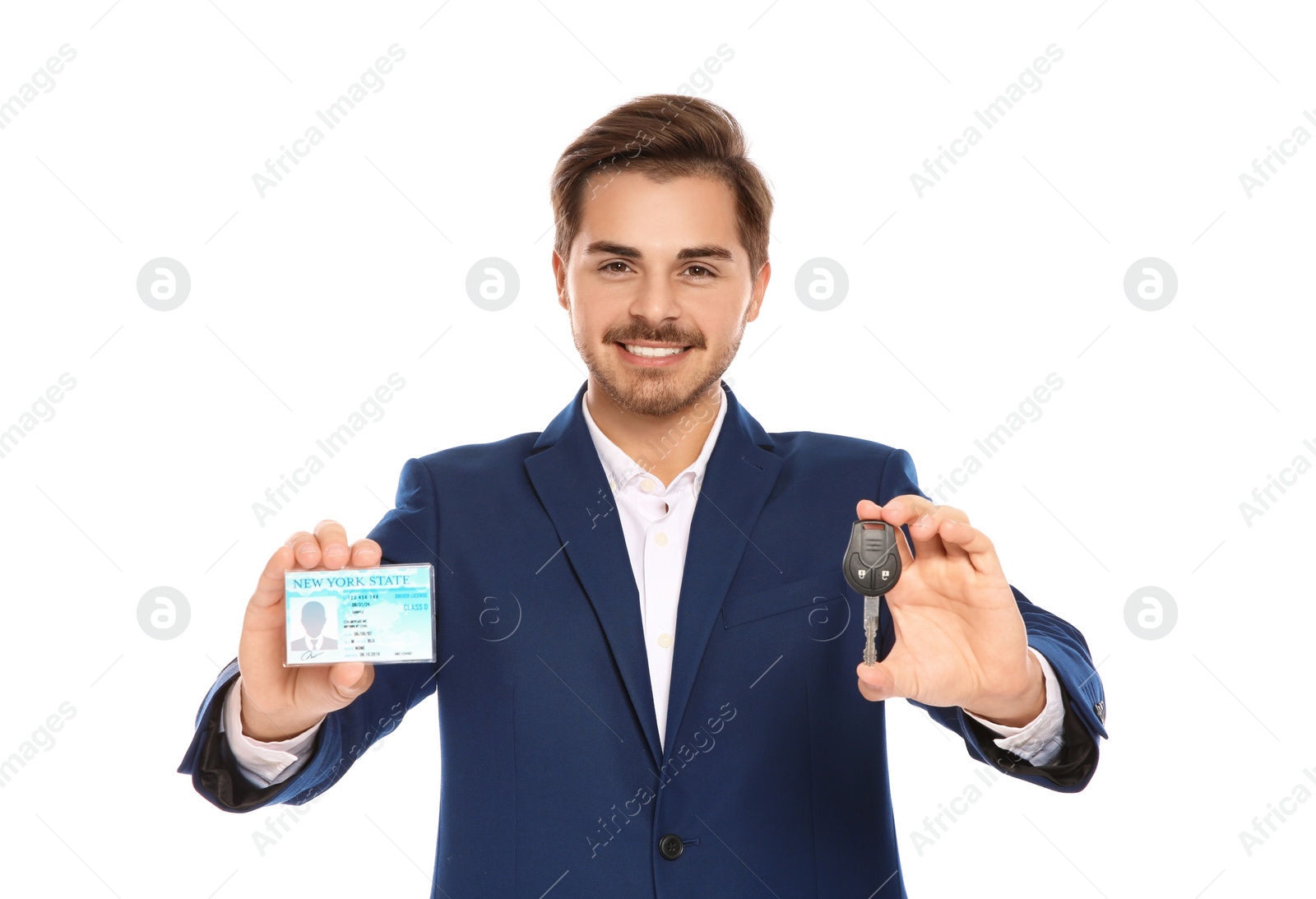 Photo of Happy young businessman with driving license and car key on white background