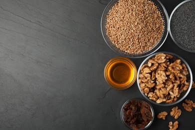 Ingredients for traditional kutia on grey table, flat lay. Space for text