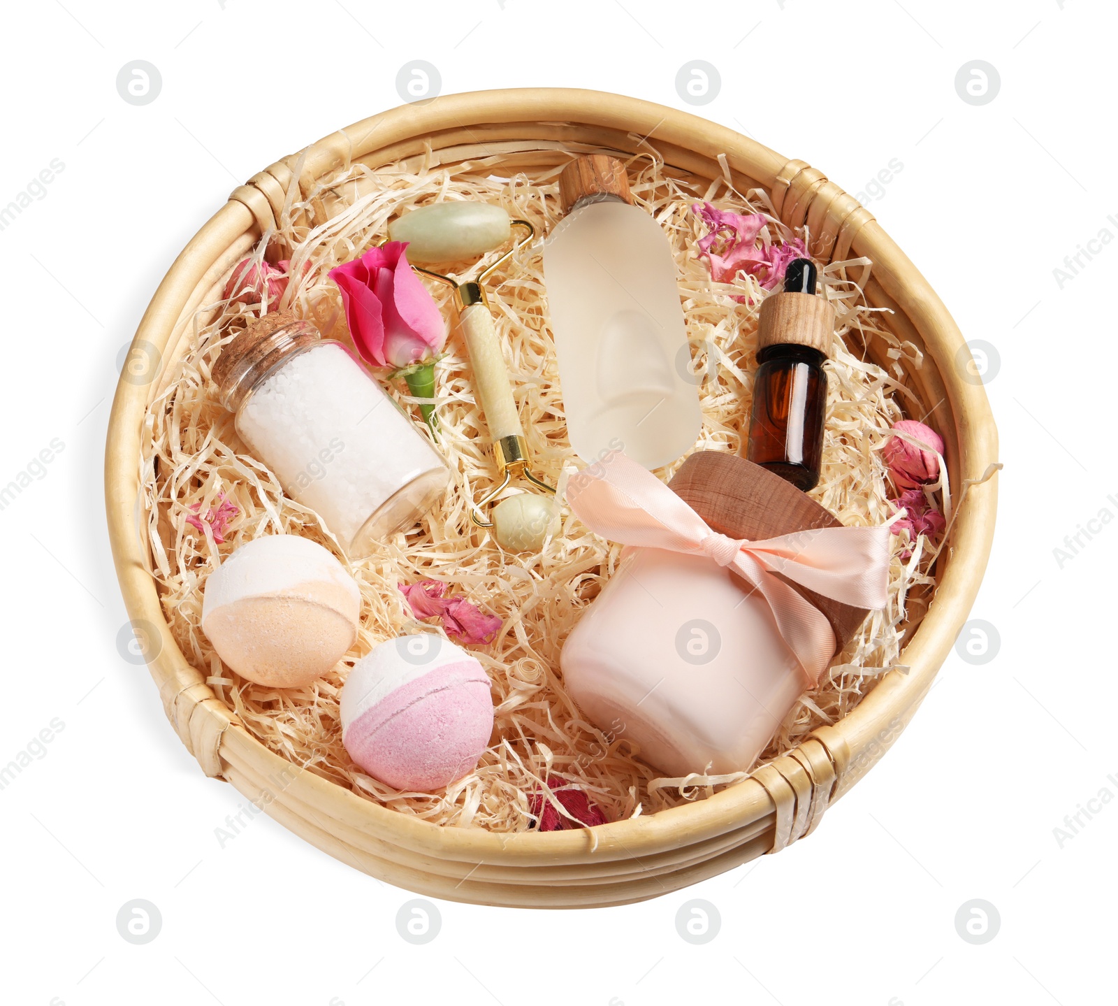 Photo of Wicker basket with different personal care products isolated on white, above view. Spa gift set