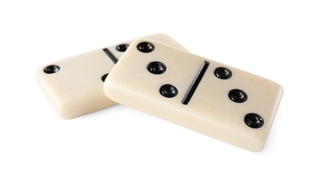Photo of Two classic domino tiles on white background