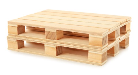 Photo of Two small wooden pallets stacked on white background