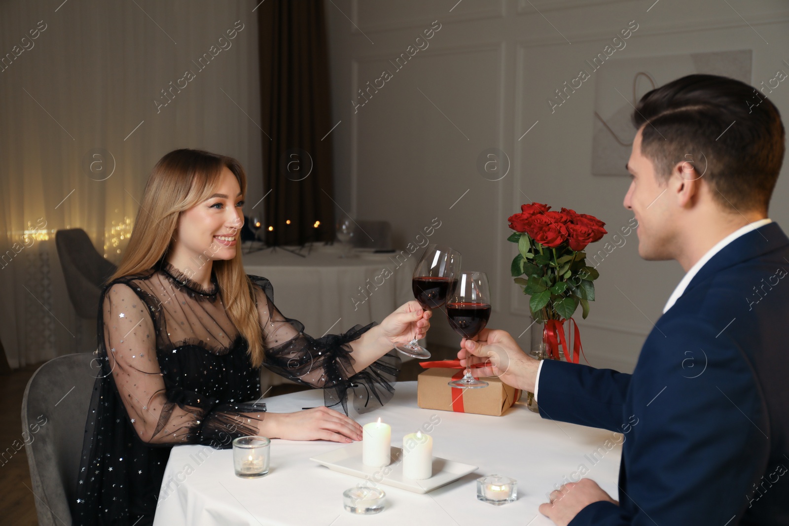 Photo of Lovely couple having romantic dinner in restaurant