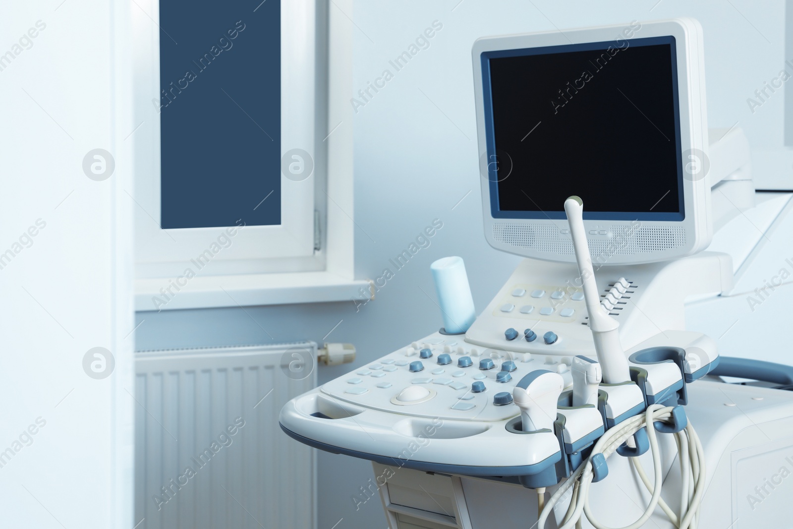 Photo of Modern ultrasound machine in office. Diagnostic technique