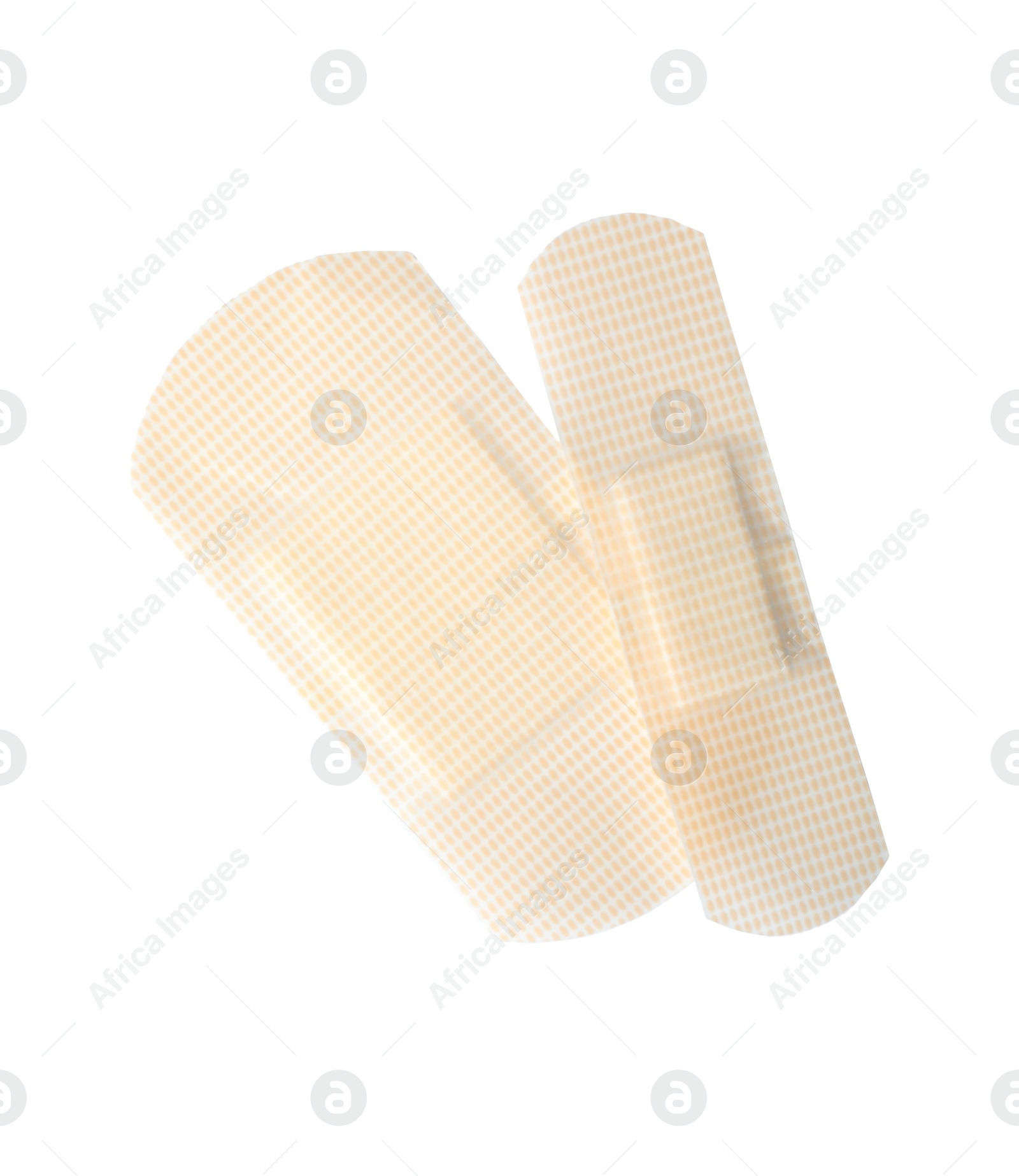 Medical sticking plasters isolated on white. First aid item Photo of Medical sticking plasters isolated on white. First aid item