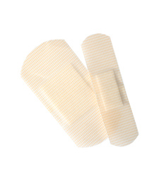 Photo of Medical sticking plasters isolated on white. First aid item