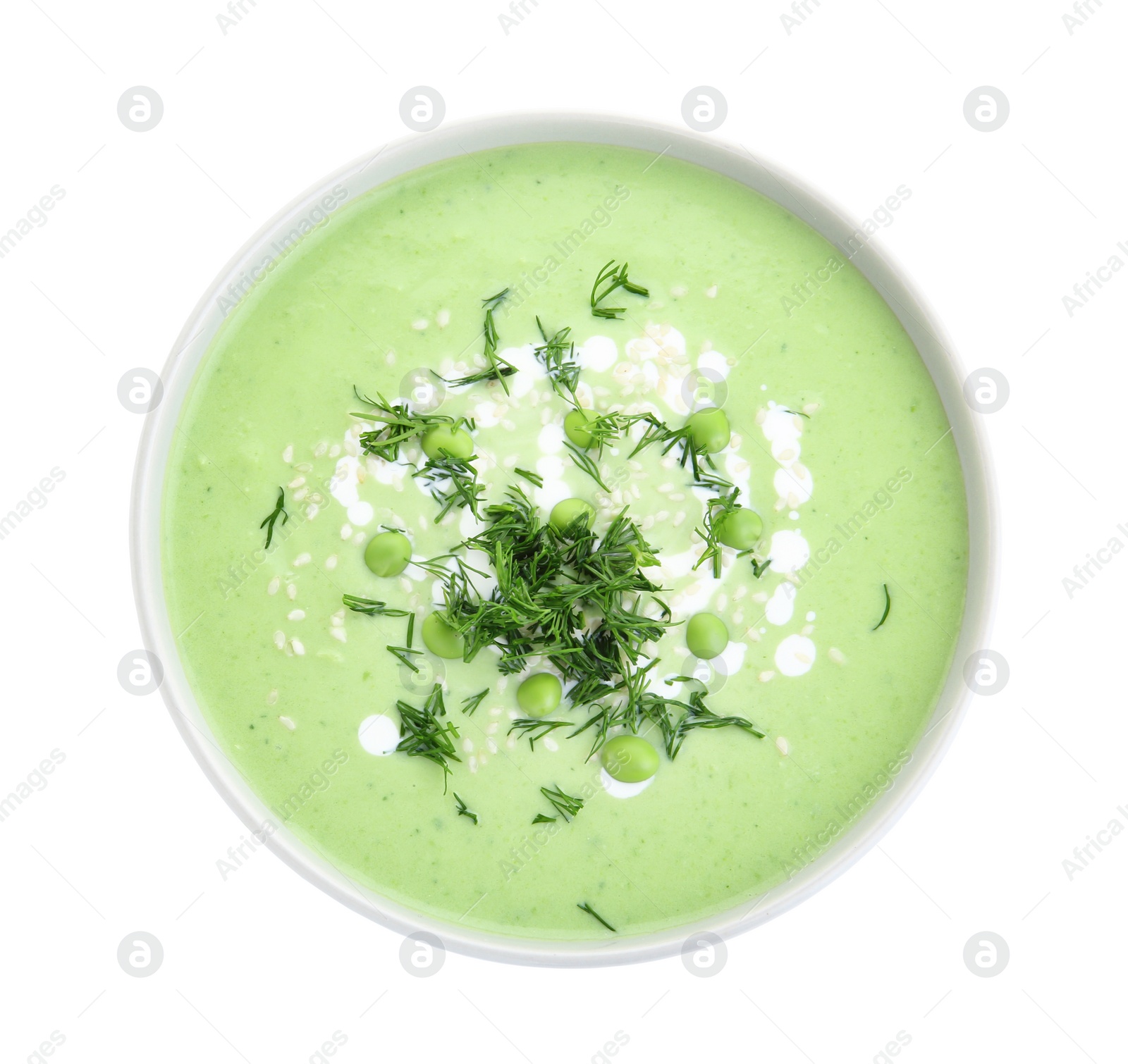 Photo of Green pea soup in bowl on white background, top view