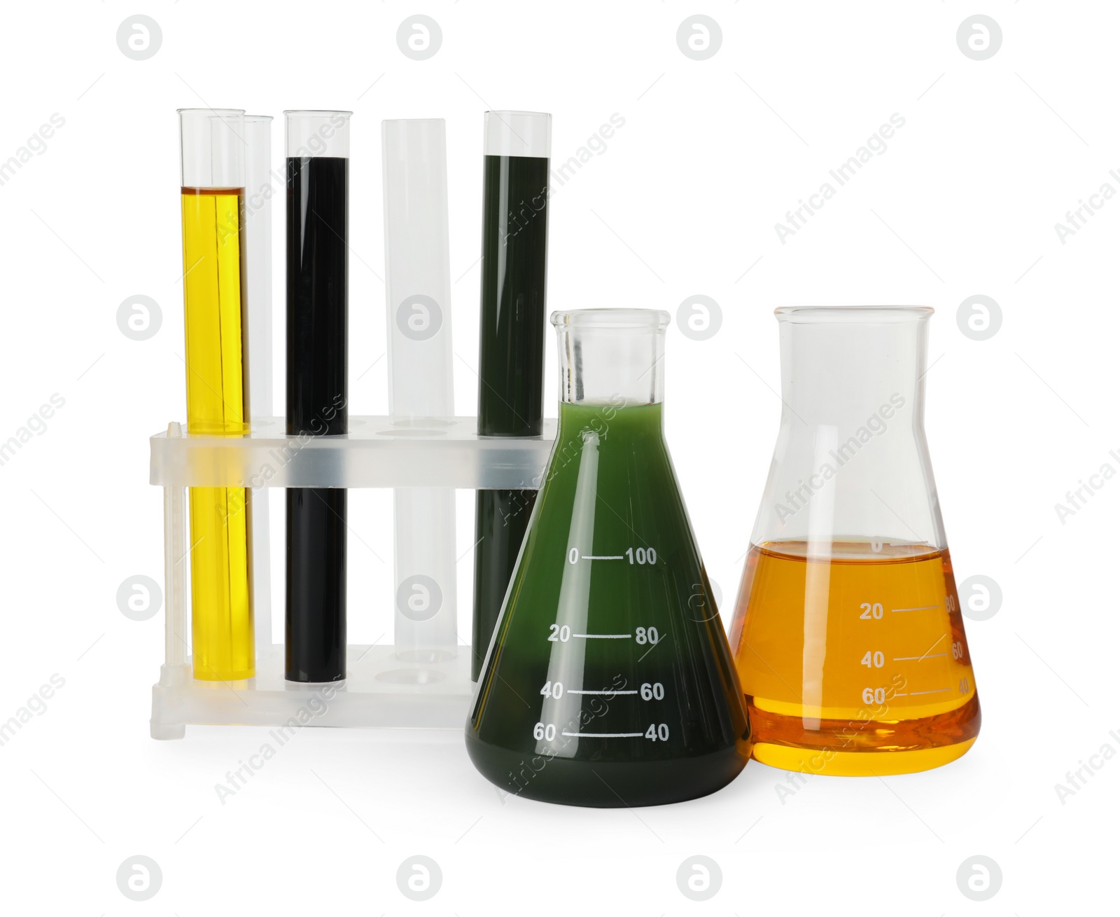 Photo of Laboratory glassware with different types of crude oil isolated on white