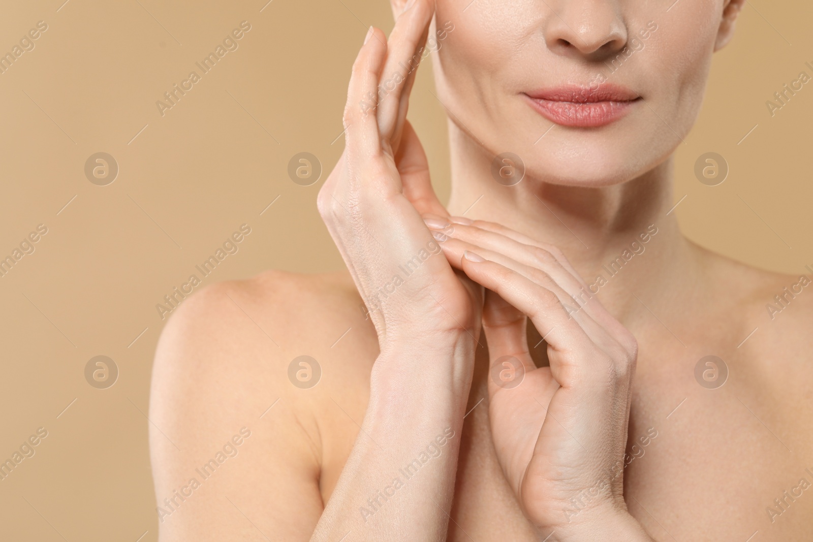 Photo of Woman with healthy skin on beige background, closeup. Space for text