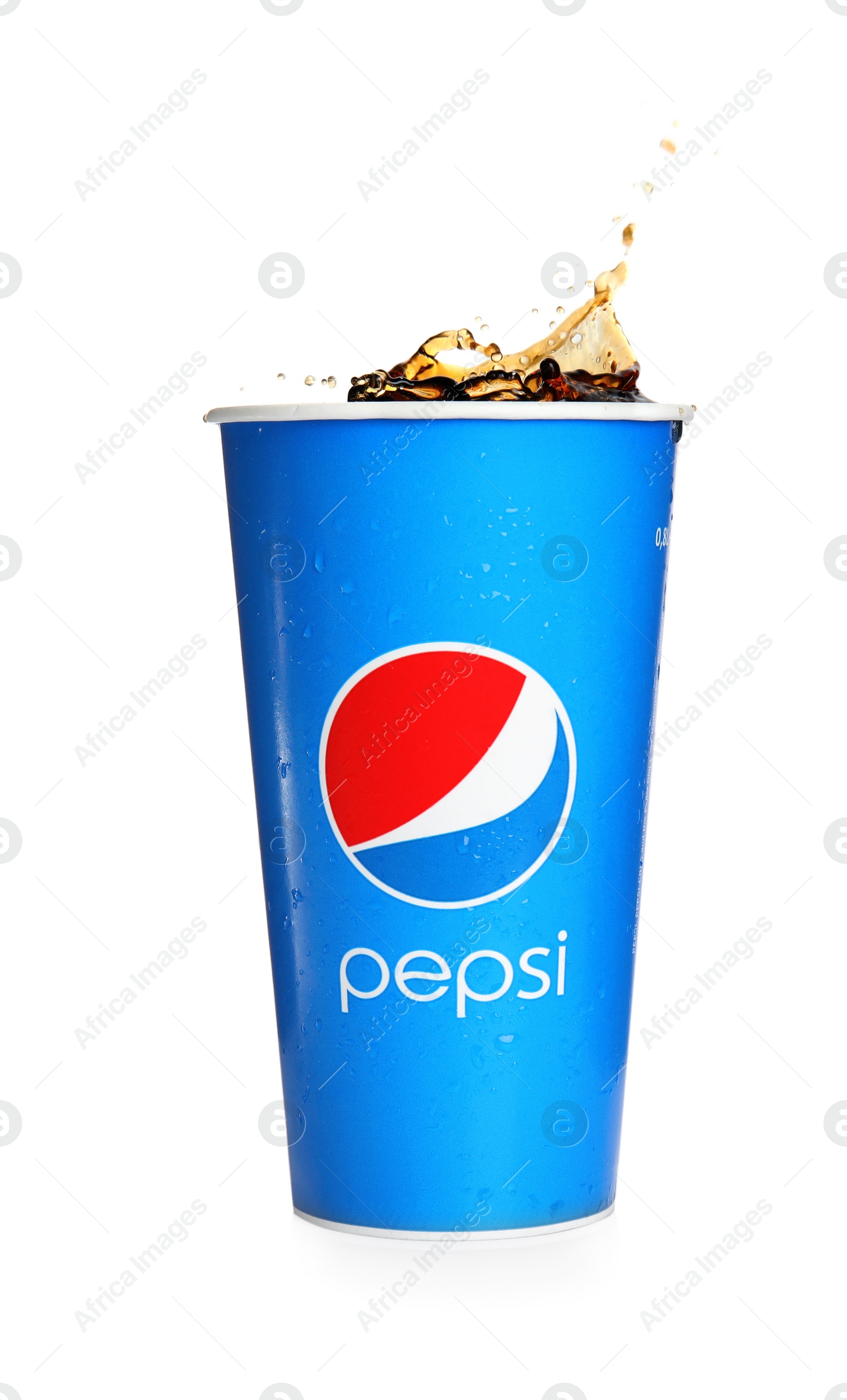 Photo of MYKOLAIV, UKRAINE - JUNE 9, 2021: Pepsi splashing out of paper cup isolated on white