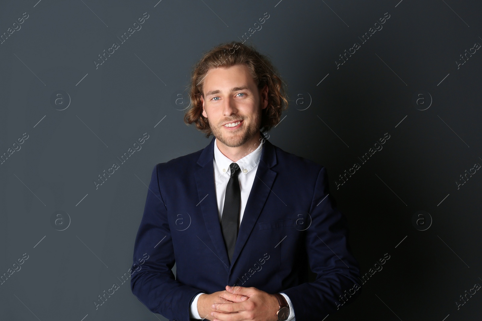 Photo of Portrait of handsome man on dark background