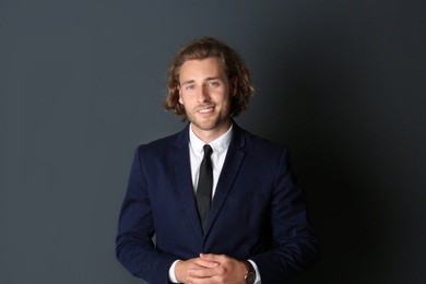 Photo of Portrait of handsome man on dark background