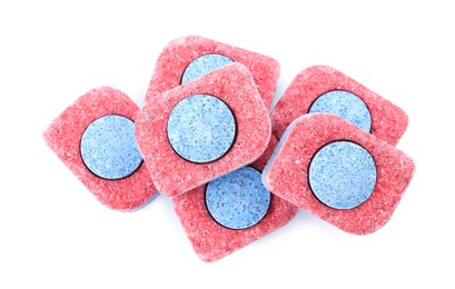 Photo of Many dishwasher detergent tablets on white background, top view