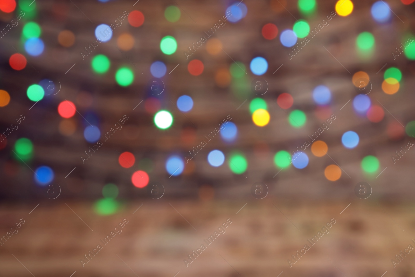 Photo of Blurred view of beautiful Christmas lights. Festive background