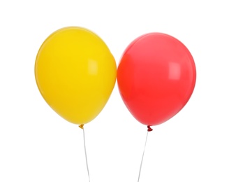 Photo of Colorful balloons on white background. Celebration time