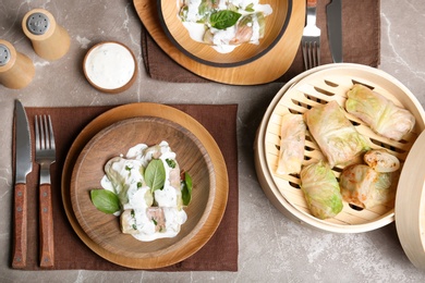 Tasty cabbage rolls served for dinner on table