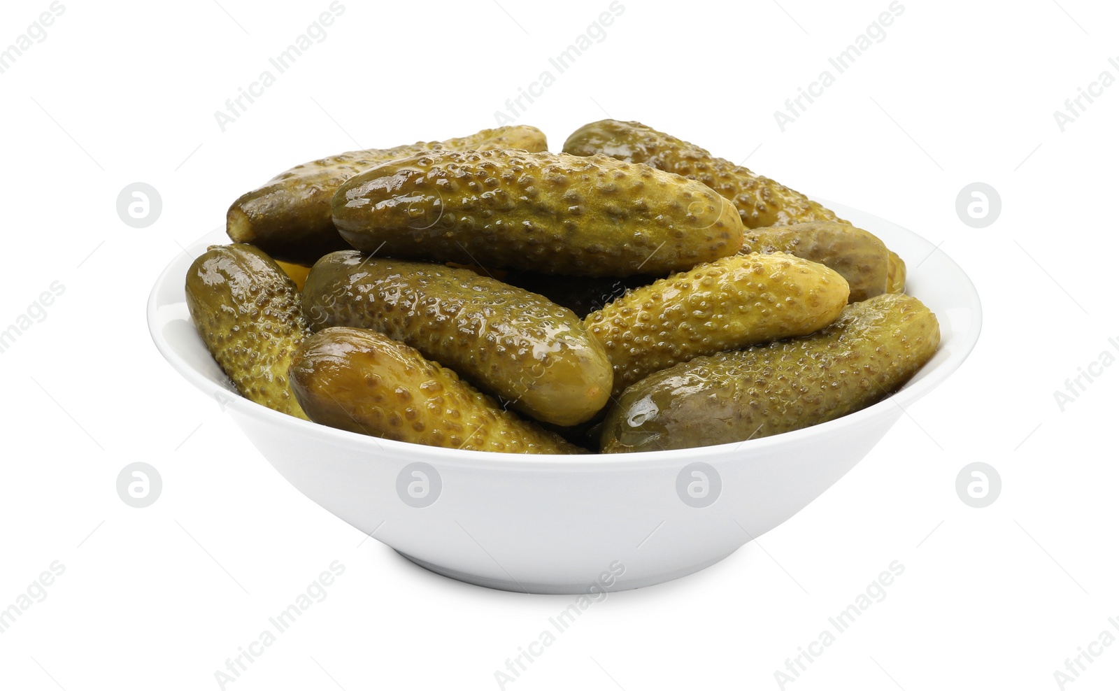 Photo of Tasty pickled cucumbers in bowl isolated on white