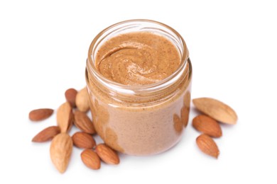 Photo of Tasty nut paste in jar and almonds isolated on white