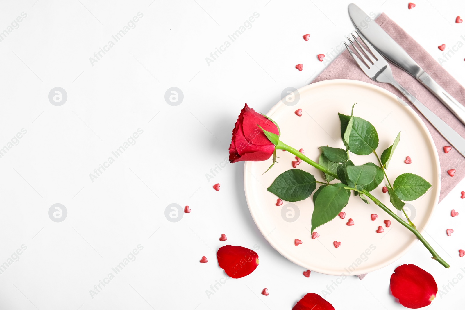 Photo of Beautiful table setting for romantic dinner on white background, flat lay. Valentine's day celebration