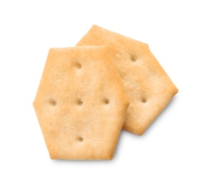 Photo of Crispy crackers isolated on white, above view. Delicious snack